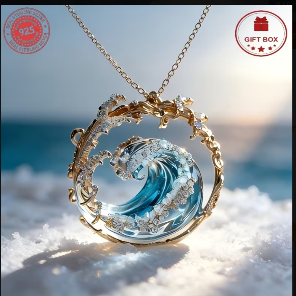 Gold-Tone Ocean Wave Pendant Necklace with Blue Crystal Accent